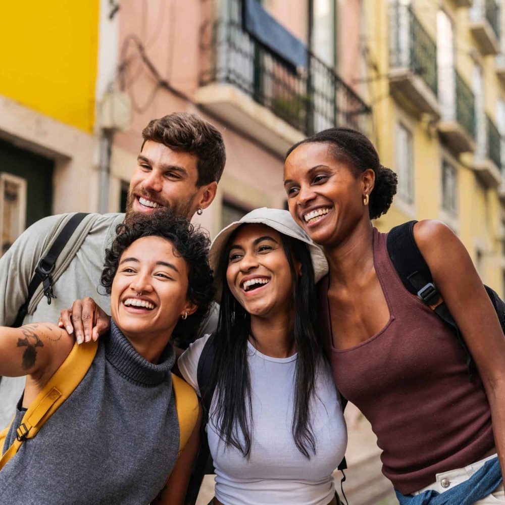 Group,Of,Multi,Ethnic,Friends,Smiling,And,Capturing,A,Selfie